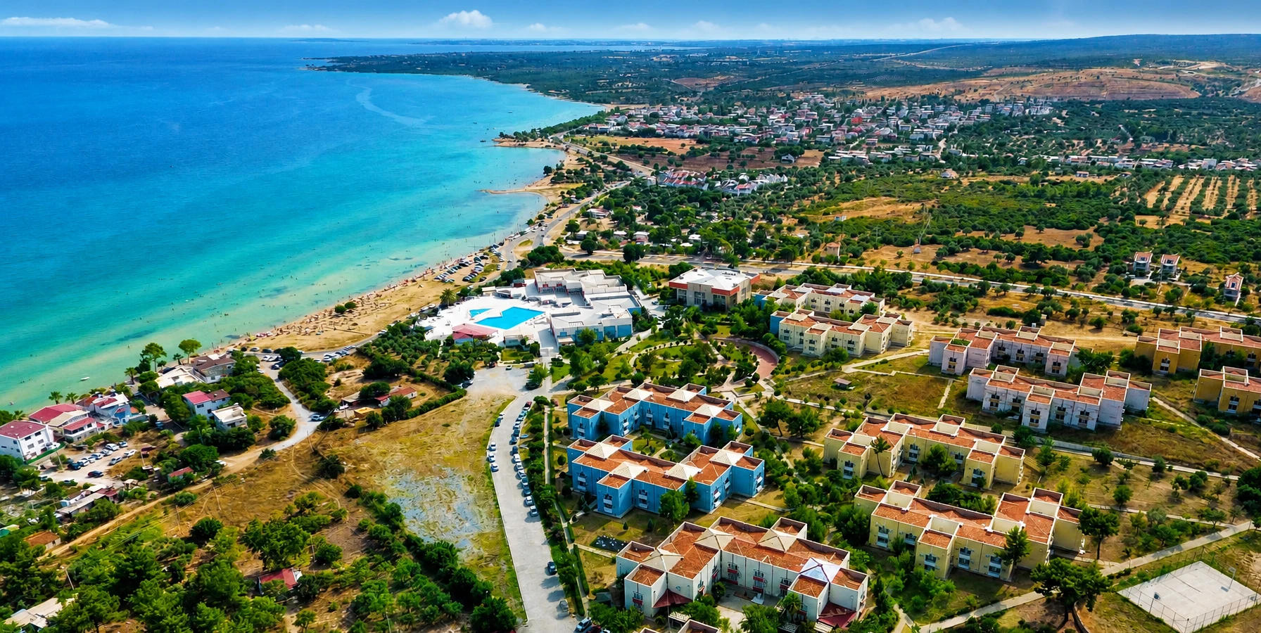Akbuk Bay turquoise Aegean Sea and green coastal hills in Didim Turkey