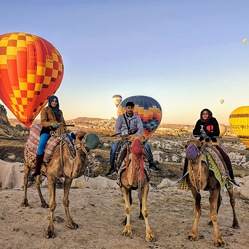 Sunrise Camel Safari with Balloons in Cappadocia